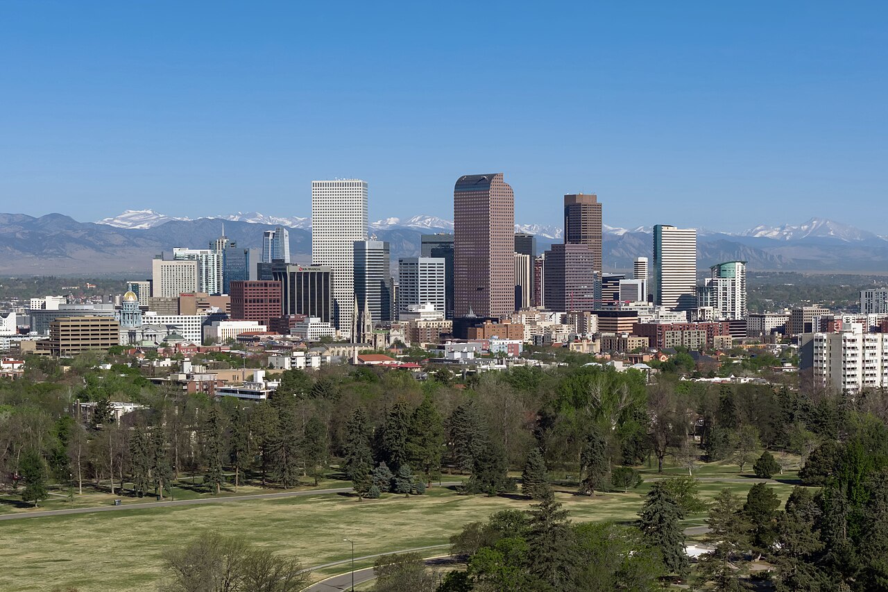 Denver skyline with the mountains in the distance.