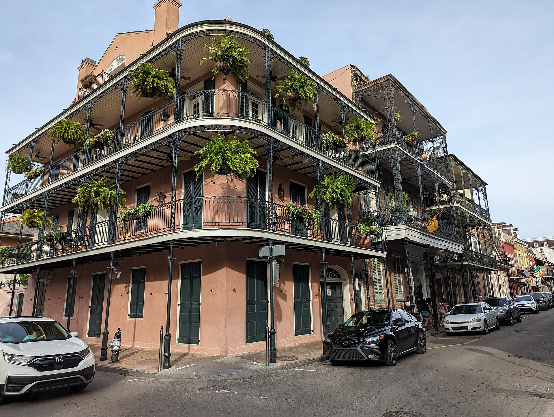 Ironwork balconies and greenery at St. Louis and Dauphine streets in the New Orleans French Quarter, Louisiana.
